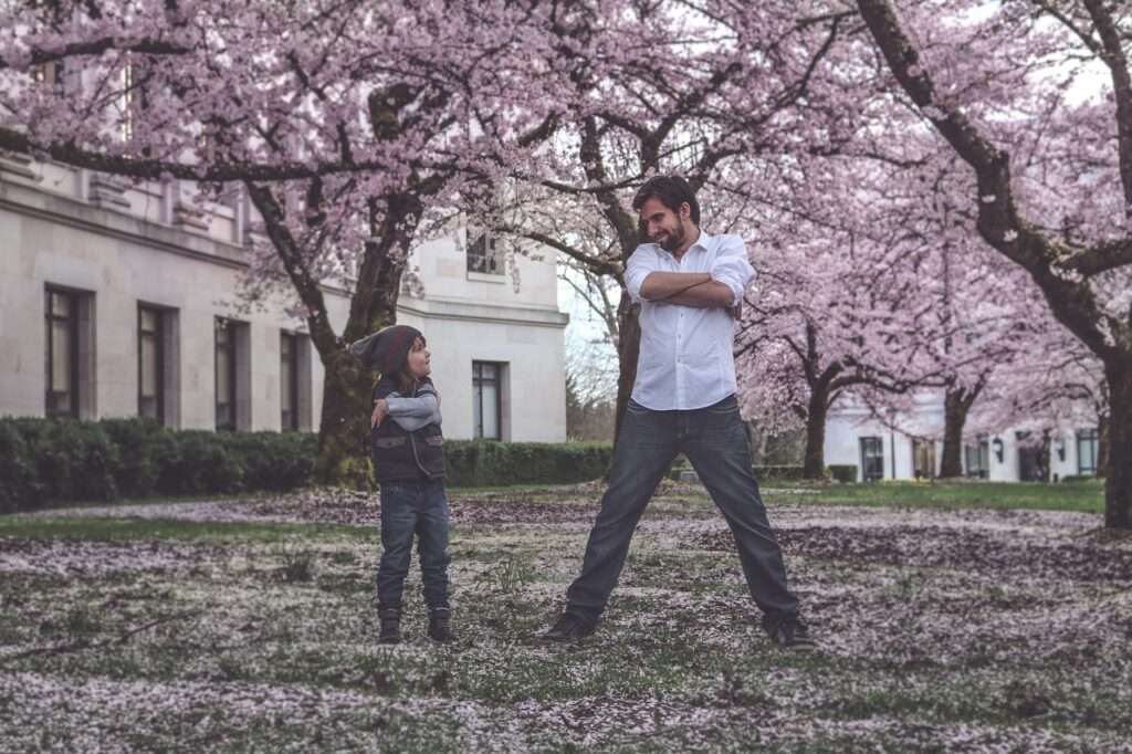 father and son in a park