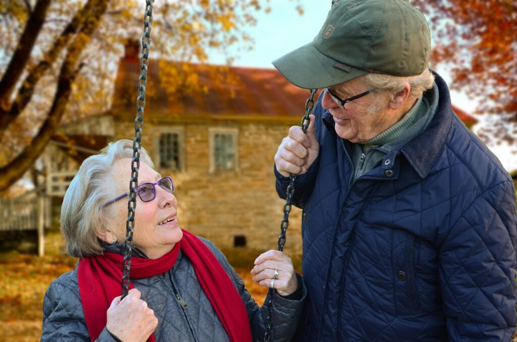 old couple on a swing