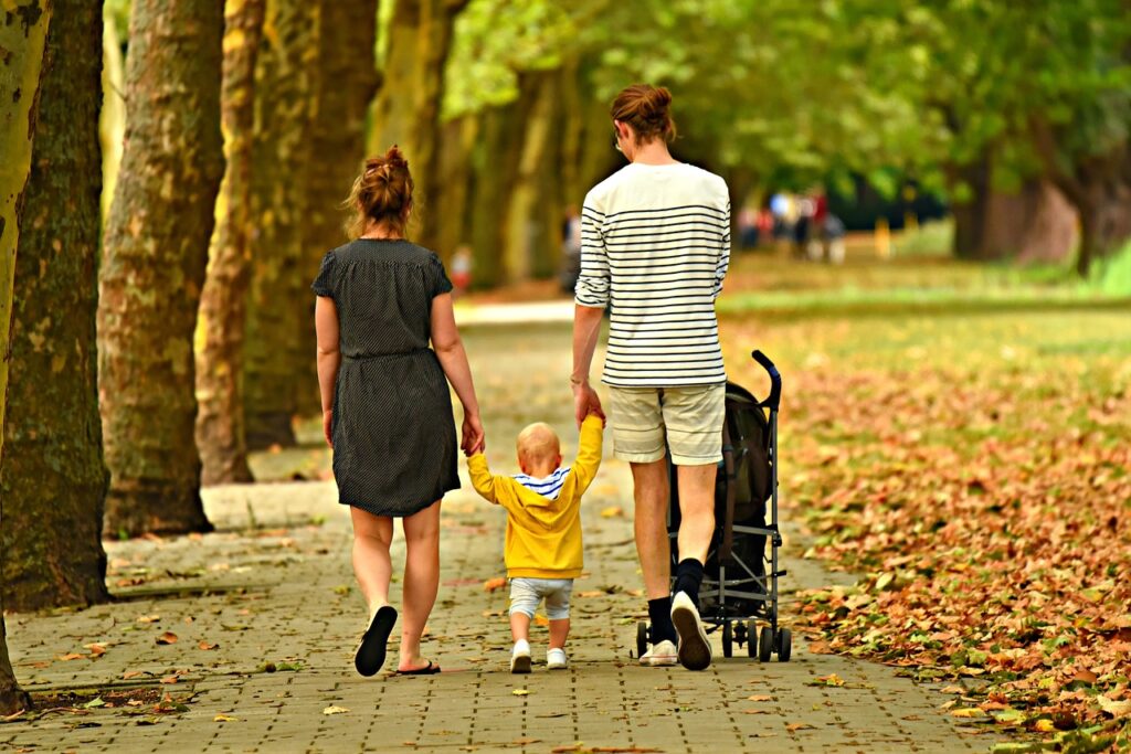 family walking in a park