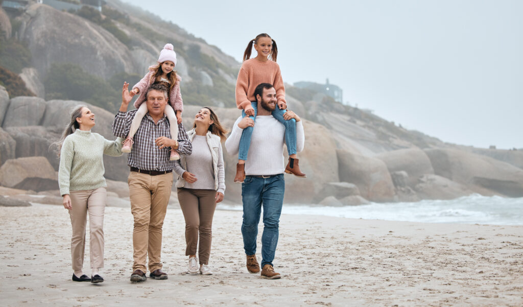 Family walking on the beach