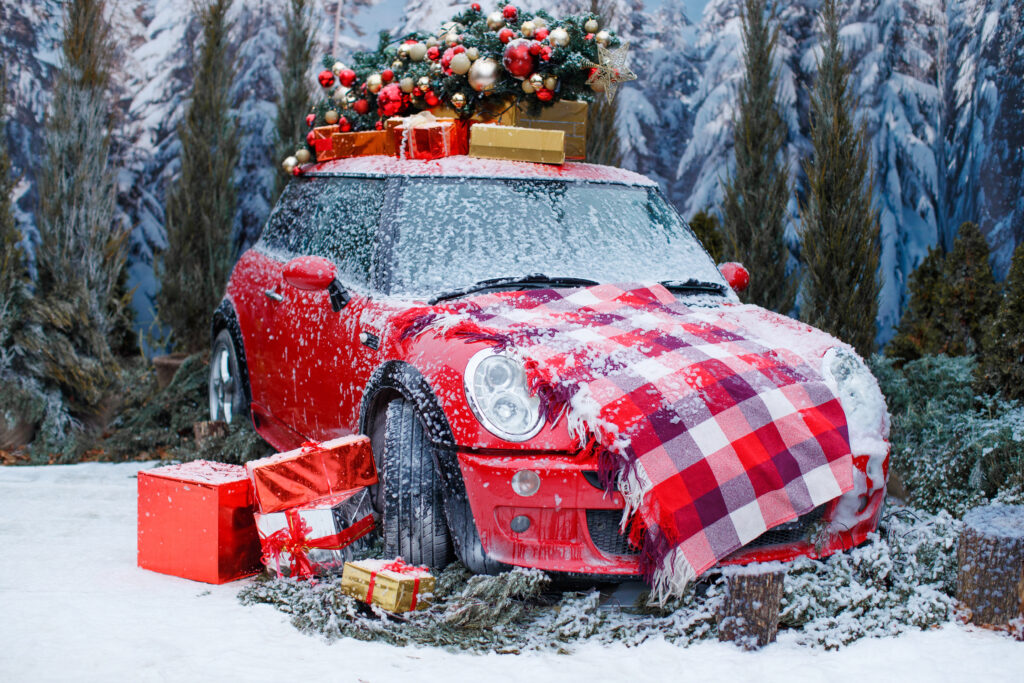 Mini car covered in Christmas gifts