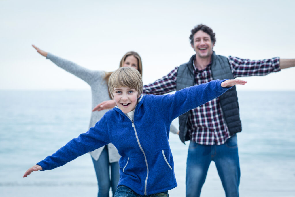 Family pretending to be airplanes